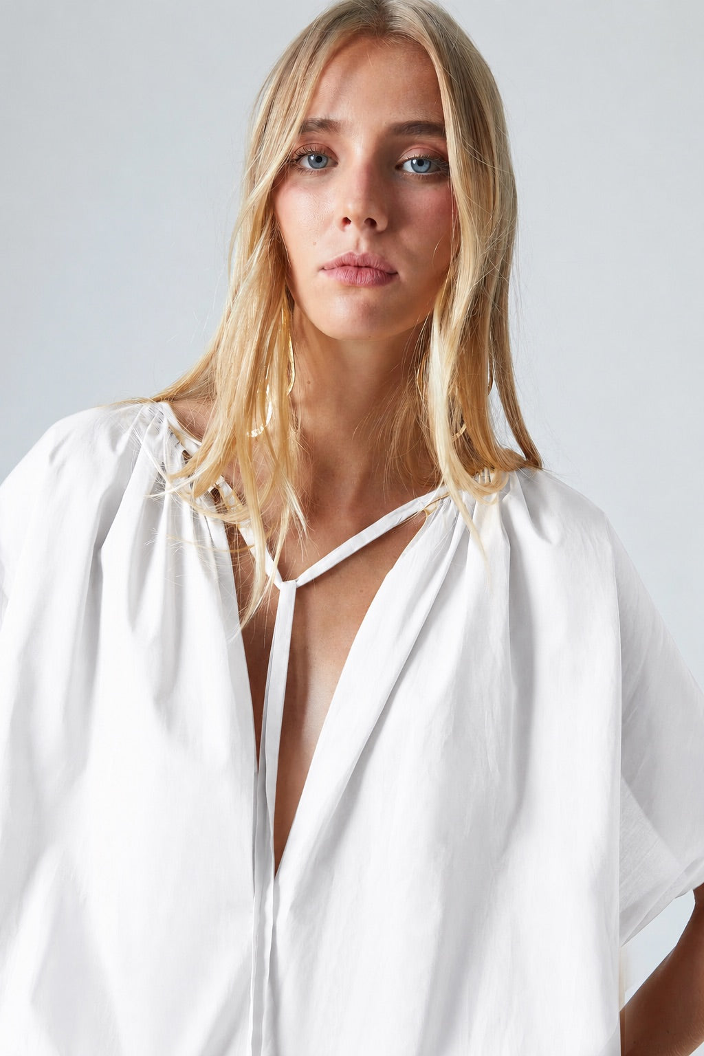 Women's Flowy Cape Blouse with Wide Sleeves | The Label Edition