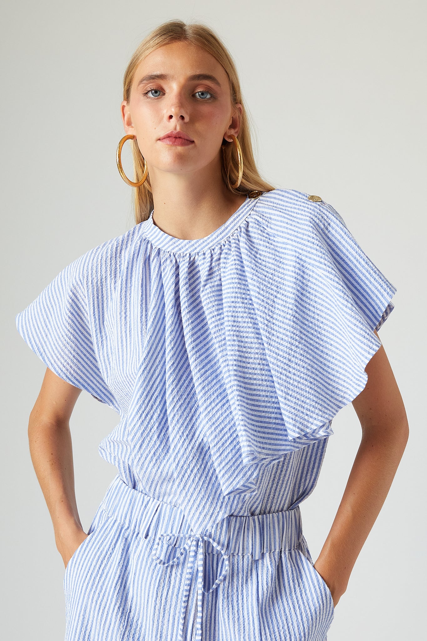 Women's Blue Striped Seersucker Ruffle Top | The Label Edition